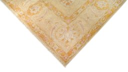 Backside of handmade New Isfahan rug showing knot structure and weave density