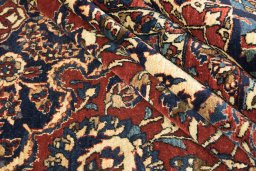 Corner detail of 1920s Isfahan rug showing border pattern and Wool pile