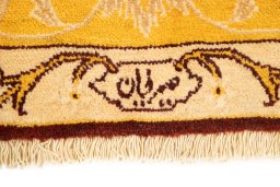 Close-up detail of New Isfahan rug from Iran / Persia showing Wool weave