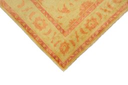 Backside of handmade New Isfahan rug showing knot structure and weave density