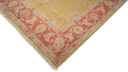 Backside of handmade New Isfahan rug showing knot structure and weave density