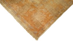 Backside of handmade New Isfahan rug showing knot structure and weave density