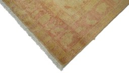 Backside of handmade New Isfahan rug showing knot structure and weave density