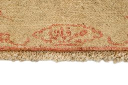 Backside of handmade New Isfahan rug showing knot structure and weave density
