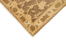 Backside of handmade New Isfahan rug showing knot structure and weave density