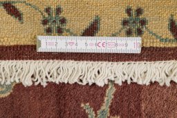 Corner detail of New Isfahan rug showing border pattern and Wool pile