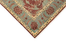 Backside of handmade New Isfahan rug showing knot structure and weave density