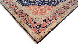 Backside of handmade New Isfahan rug showing knot structure and weave density