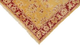 Backside of handmade New Isfahan rug showing knot structure and weave density