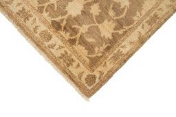 Backside of handmade New Isfahan rug showing knot structure and weave density