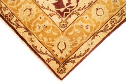 Backside of handmade New Isfahan rug showing knot structure and weave density