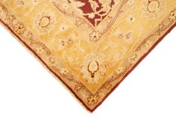 Backside of handmade New Isfahan rug showing knot structure and weave density