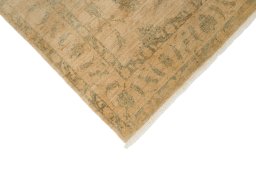 Backside of handmade New Isfahan rug showing knot structure and weave density