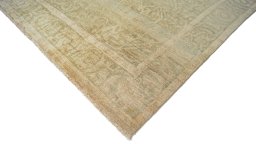 Backside of handmade New Isfahan rug showing knot structure and weave density