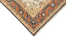 Backside of handmade New Isfahan rug showing knot structure and weave density