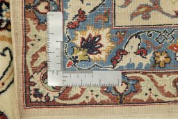 Corner detail of 1970s Isfahan rug showing border pattern and Silk pile