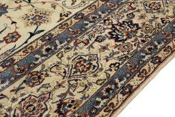 Close-up detail of 1970s Isfahan rug from Iran / Persia showing Silk weave