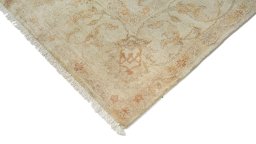 Backside of handmade New Isfahan rug showing knot structure and weave density