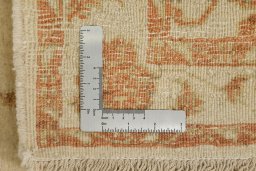 Corner detail of New Isfahan rug showing border pattern and Wool pile