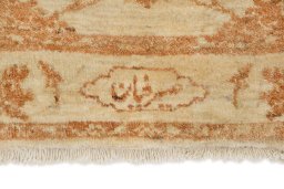 Backside of handmade New Isfahan rug showing knot structure and weave density