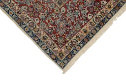 Surface texture of 1970s Isfahan rug with natural Cork and intricate pattern