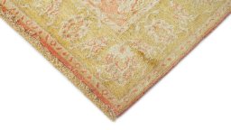 Backside of handmade New Isfahan rug showing knot structure and weave density