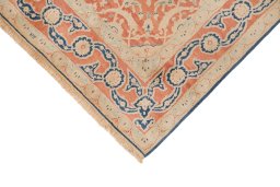 Backside of handmade New Isfahan rug showing knot structure and weave density