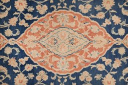 Central medallion detail of New Isfahan rug from Iran / Persia