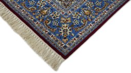 Backside of handmade 1990s Isfahan rug showing knot structure and weave density