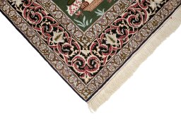 Backside of handmade New Isfahan rug showing knot structure and weave density