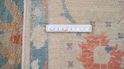 Corner detail of New Isfahan rug showing border pattern and Wool pile
