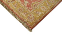 Backside of handmade New Isfahan rug showing knot structure and weave density