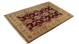 Corner detail of New Isfahan rug showing border pattern and Wool pile