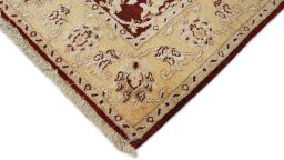 Backside of handmade New Isfahan rug showing knot structure and weave density