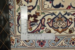 Corner detail of 1980s Isfahan rug showing border pattern and Wool pile