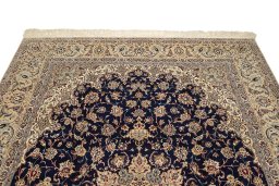 Surface texture of 1980s Isfahan rug with natural Wool and intricate pattern