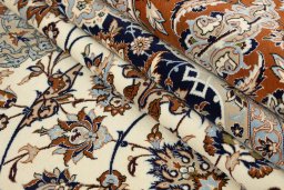 Corner detail of 1980s Isfahan rug showing border pattern and Wool pile