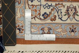 Close-up detail of 1980s Isfahan rug from Iran / Persia showing Wool weave