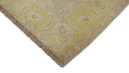 Backside of handmade New Isfahan rug showing knot structure and weave density