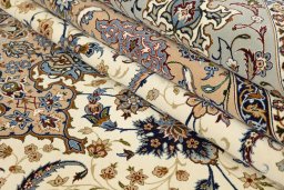 Corner detail of New Isfahan rug showing border pattern and Wool pile