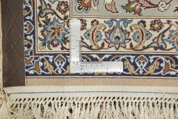 Close-up detail of New Isfahan rug from Iran / Persia showing Wool weave