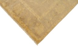 Backside of handmade New Isfahan rug showing knot structure and weave density