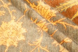 Corner detail of New Isfahan rug showing border pattern and Wool pile
