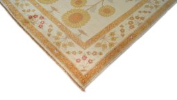 Backside of handmade New Isfahan rug showing knot structure and weave density