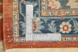 Close-up detail of 1980s Isfahan rug from Iran / Persia showing Wool weave