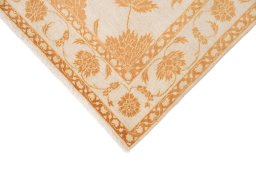 Backside of handmade New Isfahan rug showing knot structure and weave density
