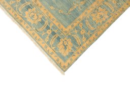 Backside of handmade New Isfahan rug showing knot structure and weave density
