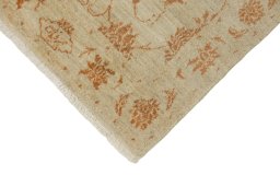 Backside of handmade New Isfahan rug showing knot structure and weave density