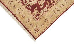 Backside of handmade New Isfahan rug showing knot structure and weave density