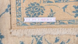 Corner detail of New Isfahan rug showing border pattern and Wool pile